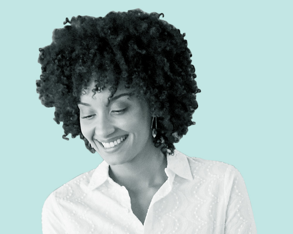 woman smiling thinking of success